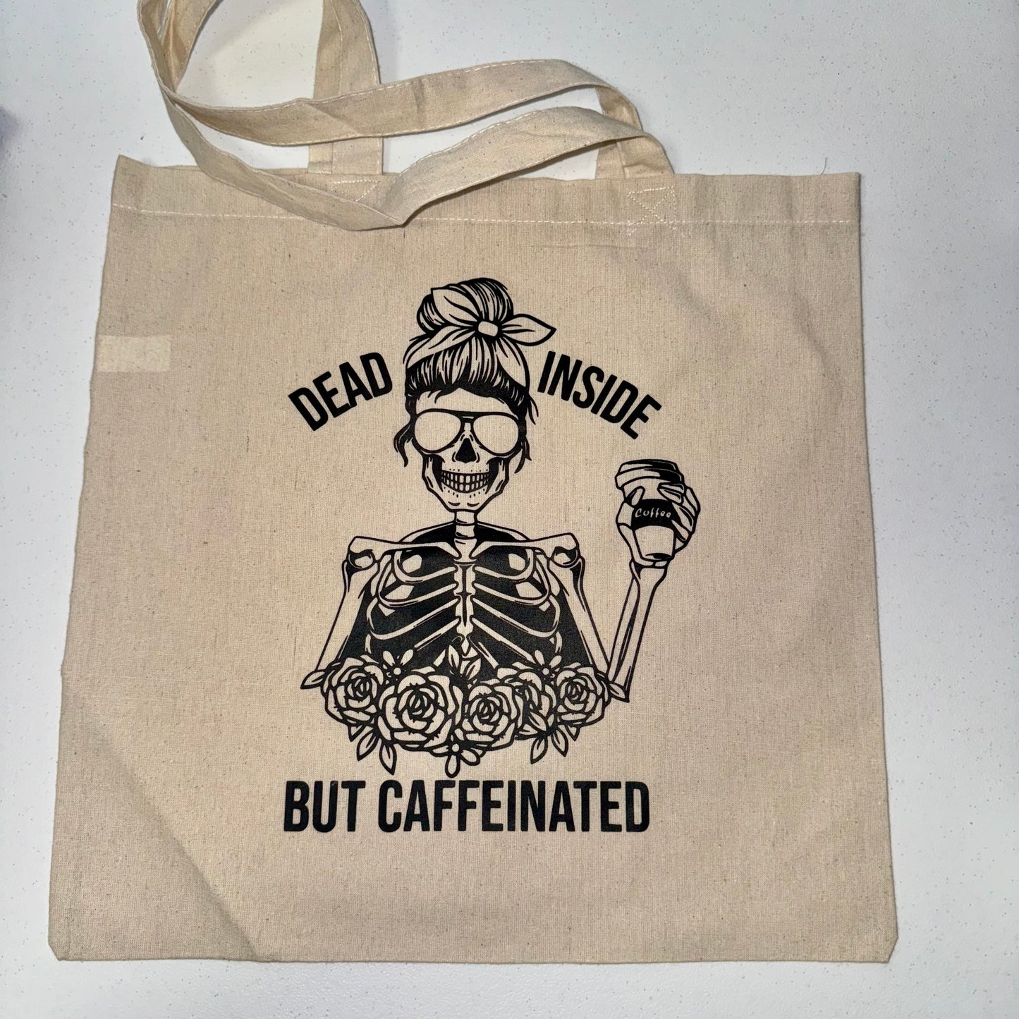 “Dead But Caffeinated” Tote Bag